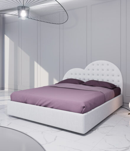 Letto matrimoniale imbottito con testata a cuore su misura