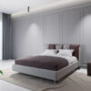 Letto matrimoniale imbottito modello Puzzle con testata modulare e design moderno