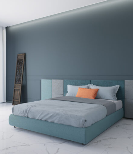 Letto matrimoniale personalizzato modello Master con testata modulare su misura e rivestimento imbottito